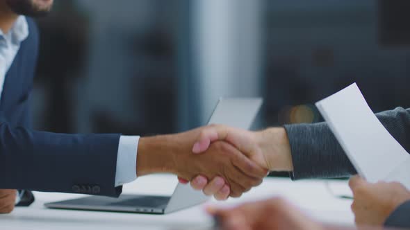 Handshaking of people different race