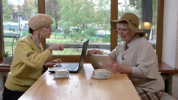 Women with Laptop and Tablet