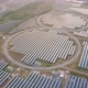 Aerial view of solar panels or solar cells on the roof in farm. Power plant with green field - VideoHive Item for Sale