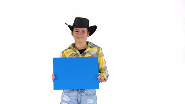 Smiling Pretty Cowgirl Holding Empty Board and Dancing on White Background.