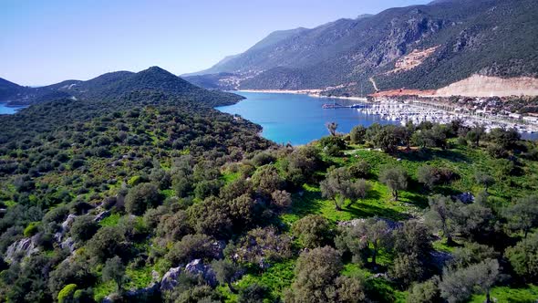 The top view from the drone of Kas resorts, bay, yahts, city in Mugla in Turkey