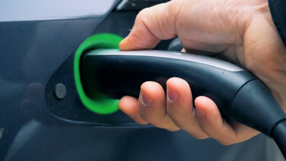 Electric Car Recharging at a Station