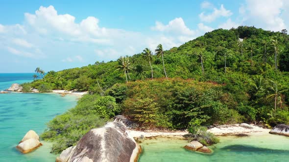 Aerial drone tourism of tropical seashore beach voyage by turquoise sea and white sandy background o