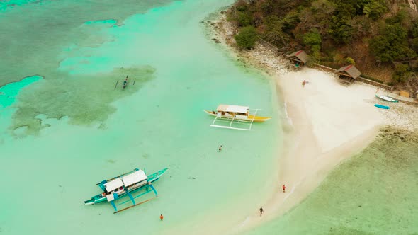 Small Torpic Island with a White Sandy Beach Top View