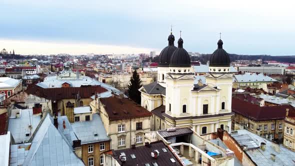 Aerial view of a drone flying over the building.