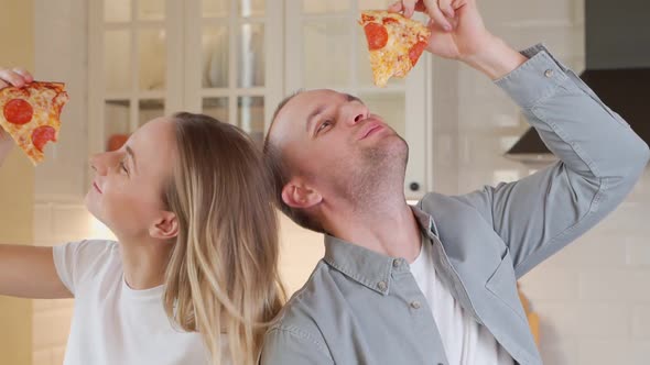 Couple Greedily Eat Delicious Pizza, Addiction To Fast Food, Unhealthy Food.
