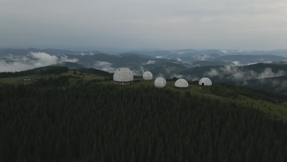 Circling around abandoned USSR radar station in the Carpathian mountains in Ukraine