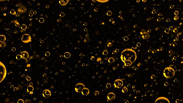 Super Slow Motion Shot of Moving Oil Bubbles Isolated on Black Background at 1000Fps