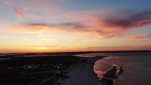 Sunset at the Seaside, Stunning Colorful Sky and Kitesurfers Gliding on Water