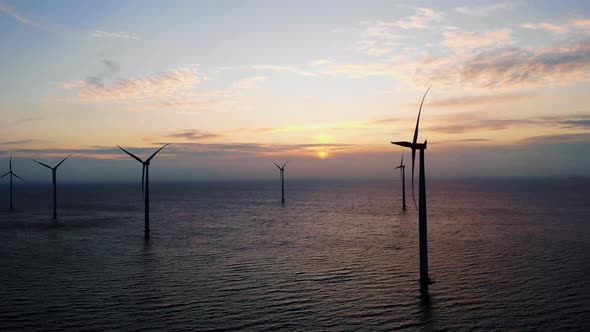 Windmill Park in the Ocean Drone Aerial View of Windmill Turbines Generating Green Energy Electric