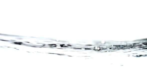 Slow motion water ripples on a white background alt