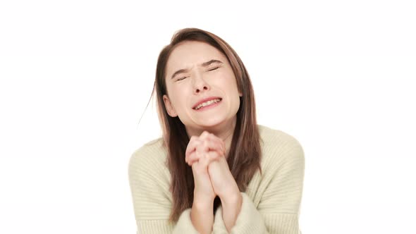 Portrait of Woman Looking Up with Keeping Hands in Praying Begging God Please Wishing Something