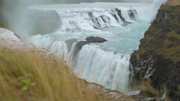 Slow motion high angle view of Gullfoss waterfall in Iceland during the fall