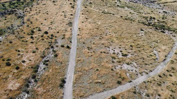 flying over a path in the tabernas desert while panning up