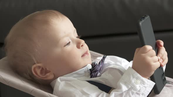 Child Having Fun Playing with Mobile Device Oneyearold Baby Boy Holding Mobile Phone Portrait of