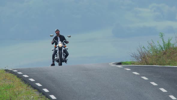 Man with his motorcycle