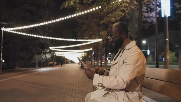 Black Man Using Digital Tablet