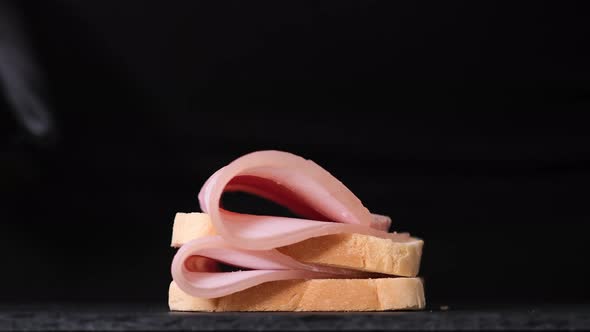 Sandwich with ham. Fast food, Chef is cooking sandwich with prosciutto cotto