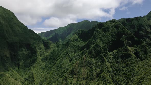 Aerial video of evergreen tropical valleys and mountains, Maui, Hawaii, USA