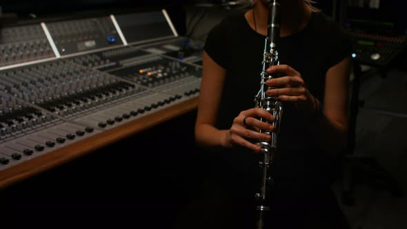 Woman playing a clarinet