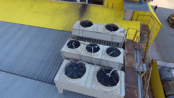 Aerial view. The old air conditioning and ventilation systems on roof of mall.