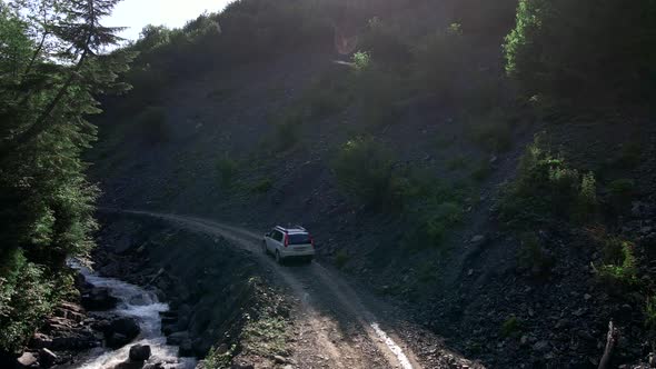 Following Car Moving By Mountains Canyon