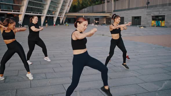 Diversity Group of Women Has a Class in Outdoor Sports Dance