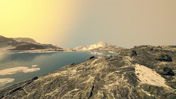 Coastline of Antarctica with Stones and Ice