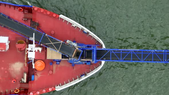 Self Unloading Barge Carrying Cargo At Sea