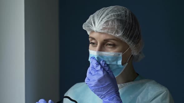 Portrait of a Tired Female Doctor or Nurse