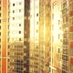 An Amazing Surreal Ascent Aerial Flight Along a Glittering Glass Apartment Building in the Sunlight - VideoHive Item for Sale