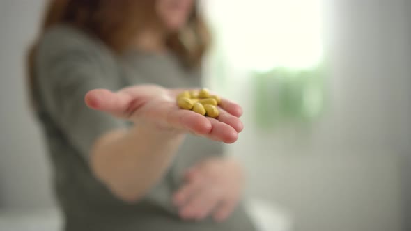 Closeup View of Pills in Hand