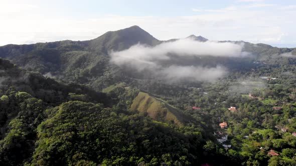 Clouds over Valle de Anton town in central Panama located in extinct volcano crater, Aerial wide ang