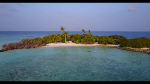 Aerial panorama of marine resort beach adventure by blue ocean with bright sand background of journe