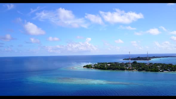 Aerial drone view panorama of marine tourist beach time by clear sea with white sand background of a