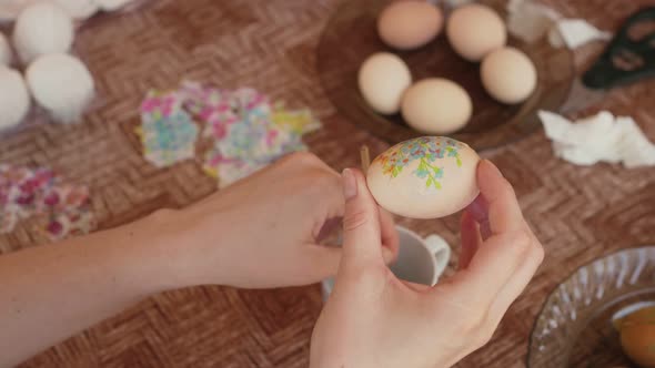 Woman Hands Decorating Easter Eggs