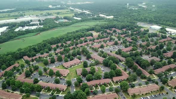 Aerial Shot of American Rooftops of Residential and Other Buildings in the River US