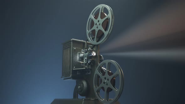 Vintage projector on the dark background. A retro device using old technology.