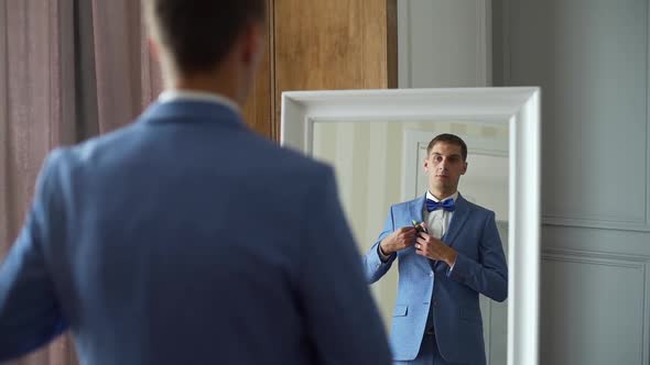 Handsome Groom Preparing for a Wedding Ceremony