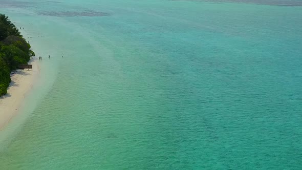 Drone aerial panorama of seashore beach break by sea with sand background