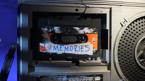 Close Up Footage Dolly of Old Audio Cassette with Inscription MEMORIES