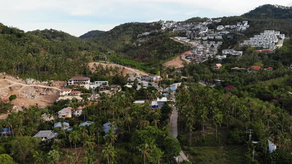 Tropical Terrain Covered with Endangered Forests and Luxury Villas. Drone View of Large Tropics with