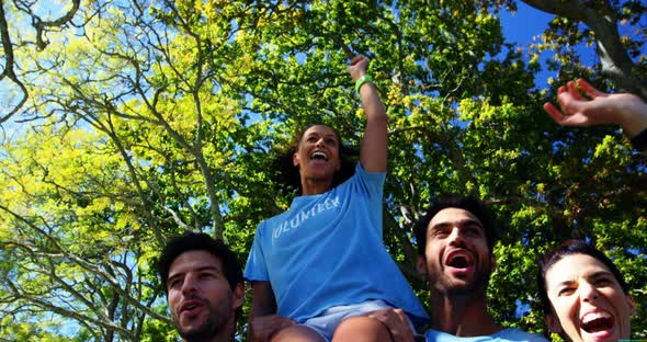 Volunteers having fun in park 4k