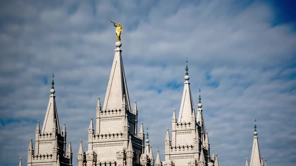 Long exposure time lapse of the upper steeples of the Mormon LDS Temple in Salt Lake City, Utah with