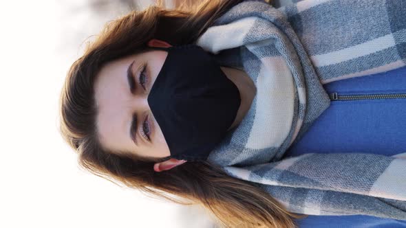 Woman Wearing Protective Reusable Barrier Mask