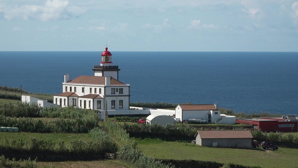 Environment. Azores. Lighthouse on the ocean. Lighthouse at the East of Sao Miguel island. Portugal.