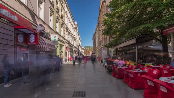 Walk on Ferhadija pedestrian street crowded with people timelapse hyperlapse