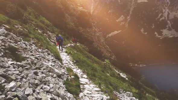 Group of Tourists Trekking in High Tatra Mountains