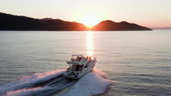 Fast moving motor yacht at the sea.