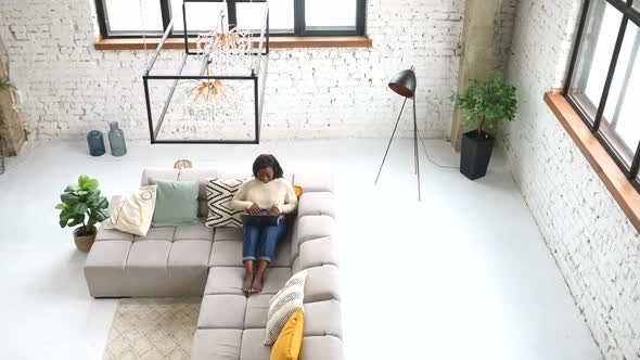 Ethnic Female Freelancer Typing on the Keyboard Studying or Working on Distance Top View